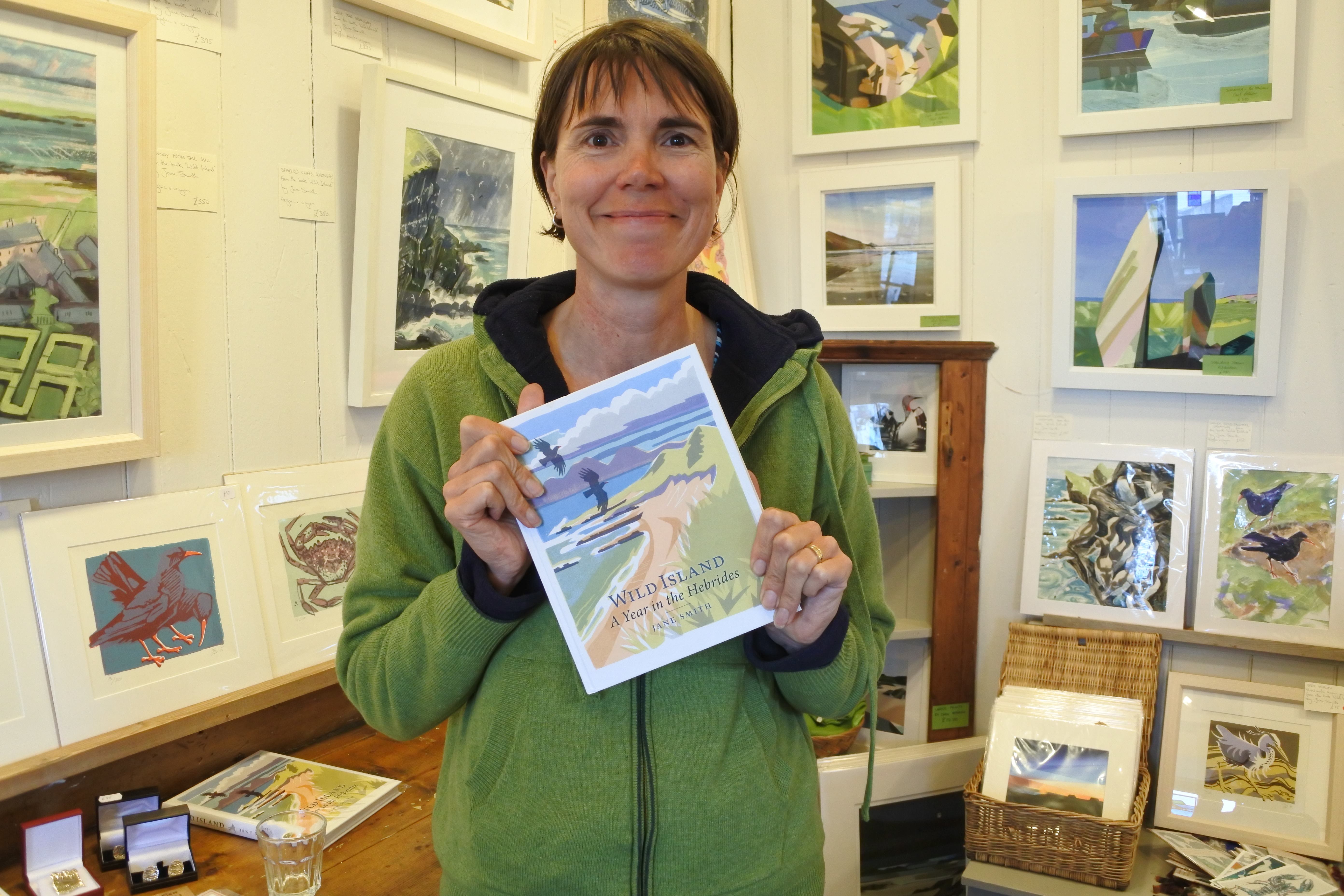 Jane Smith with book - Corncrake Community Newsletters